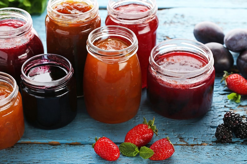 Closeup of jams in sterilised jars