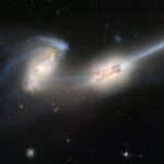Hubble Captures Unusual Galaxy Merger in Ancient Universe