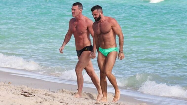 Luke Evans Hit the Beach in Miami With Boyfriend Fran Tomas; Couple Flaunts Their Sexy Muscular Bods in Tiny Trunks (View Pics) - OKEEDA